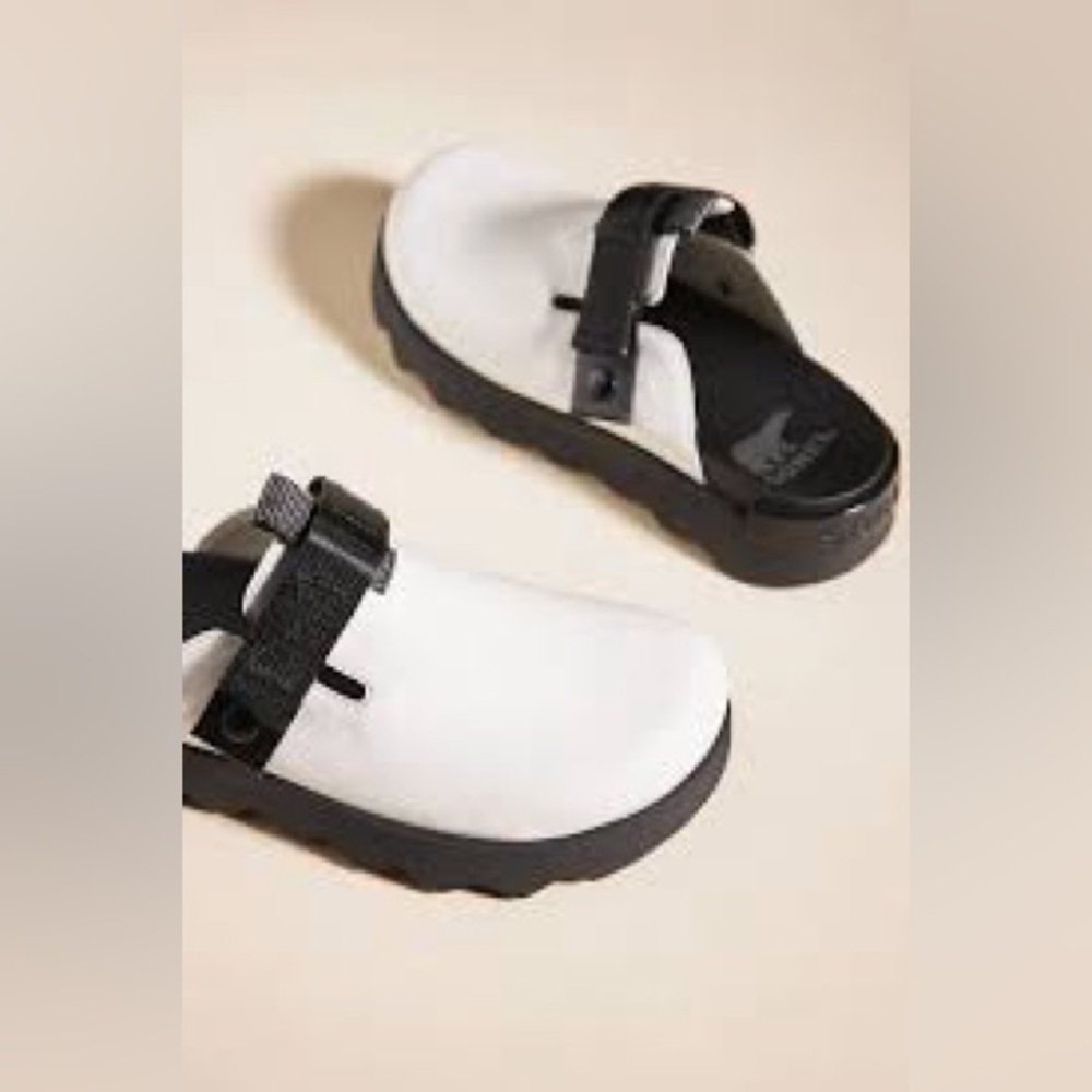 Women's  Sorel Black and White Clogs